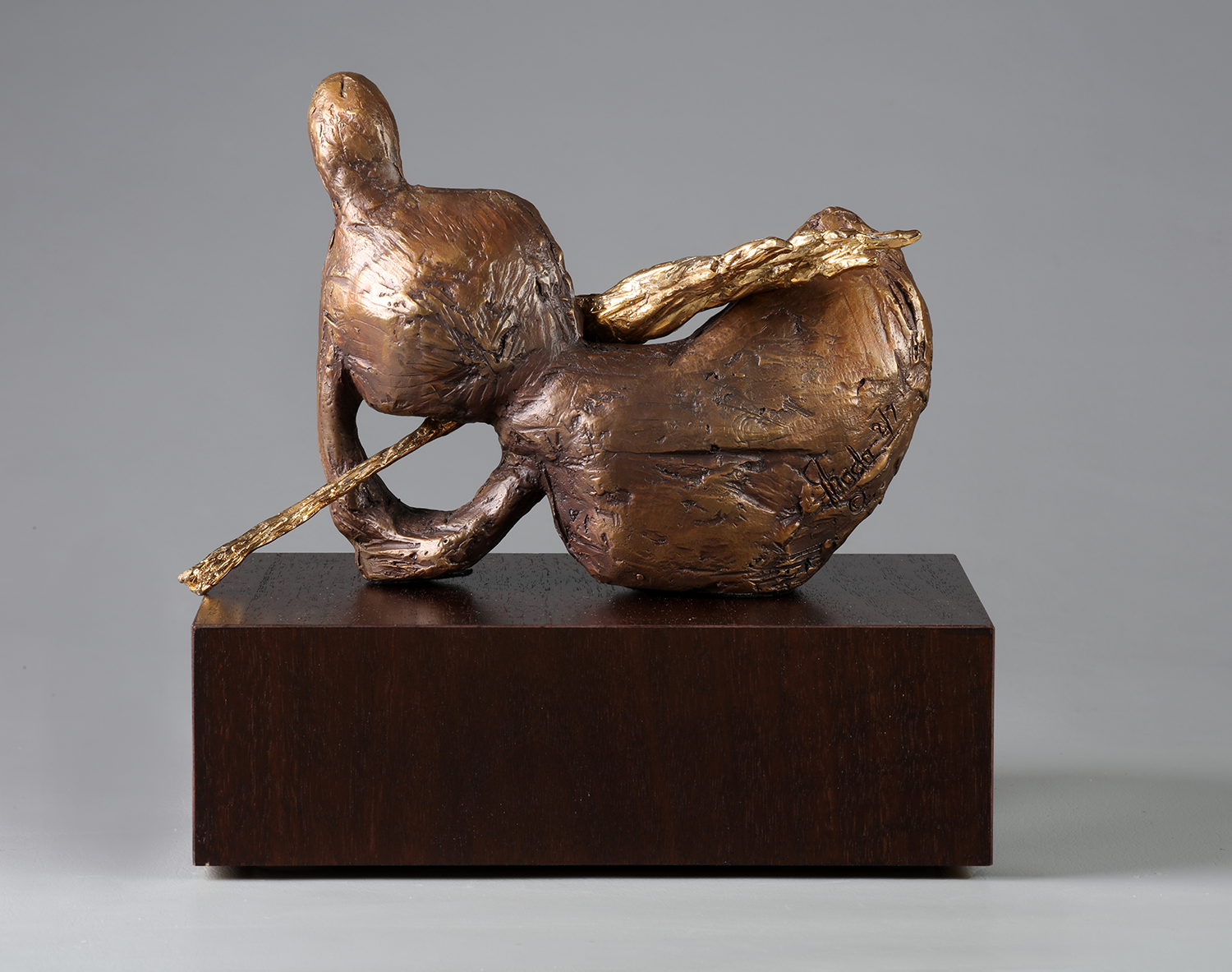 Earth bronze sculpture back view