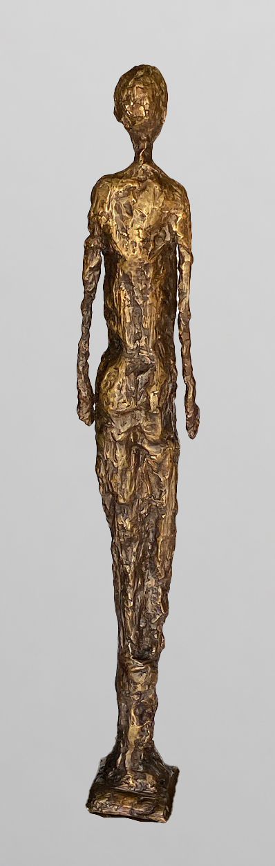 Man bronze sculpture back view