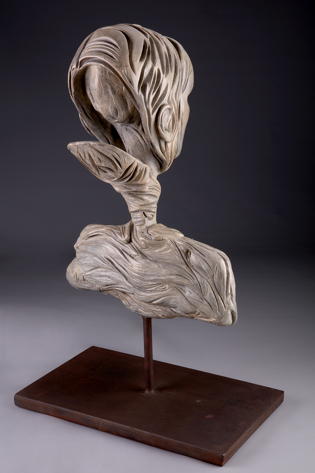 To Please bronze sculpture back view
