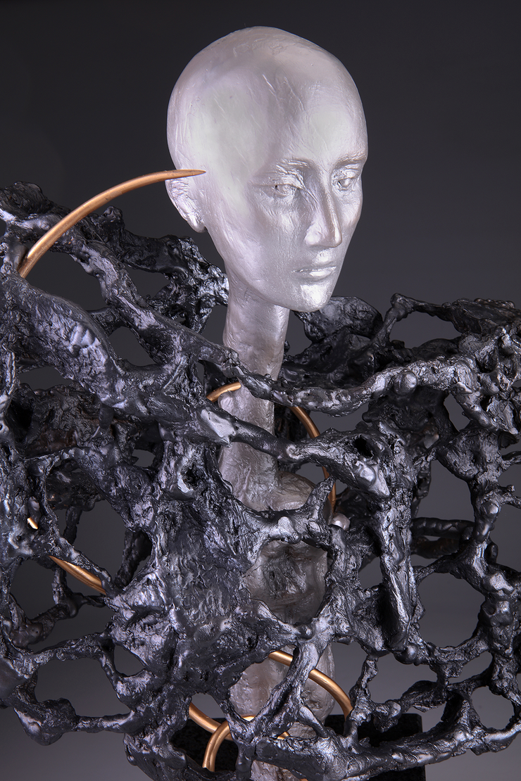 Consumed bronze sculpture